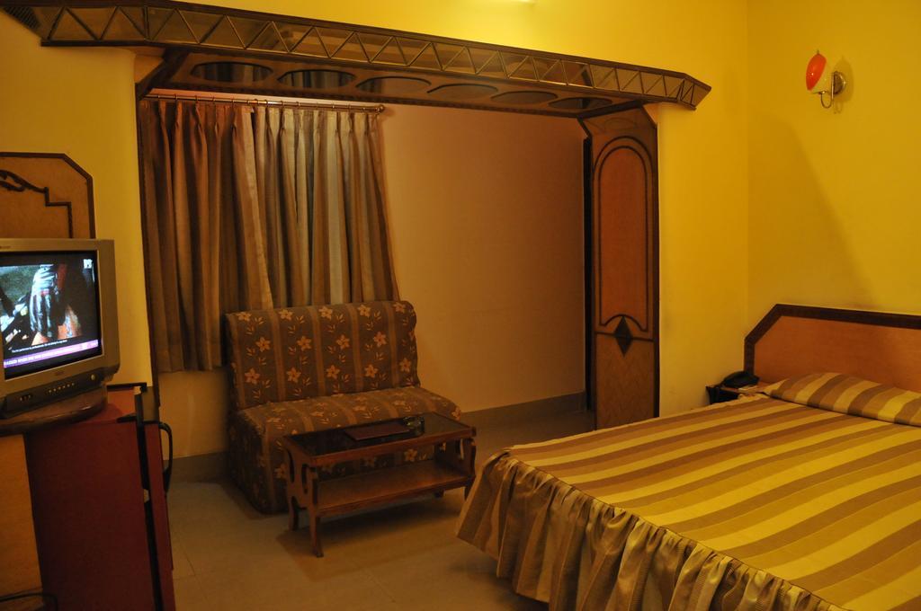 Hotel Heera Calcutta Rum bild
