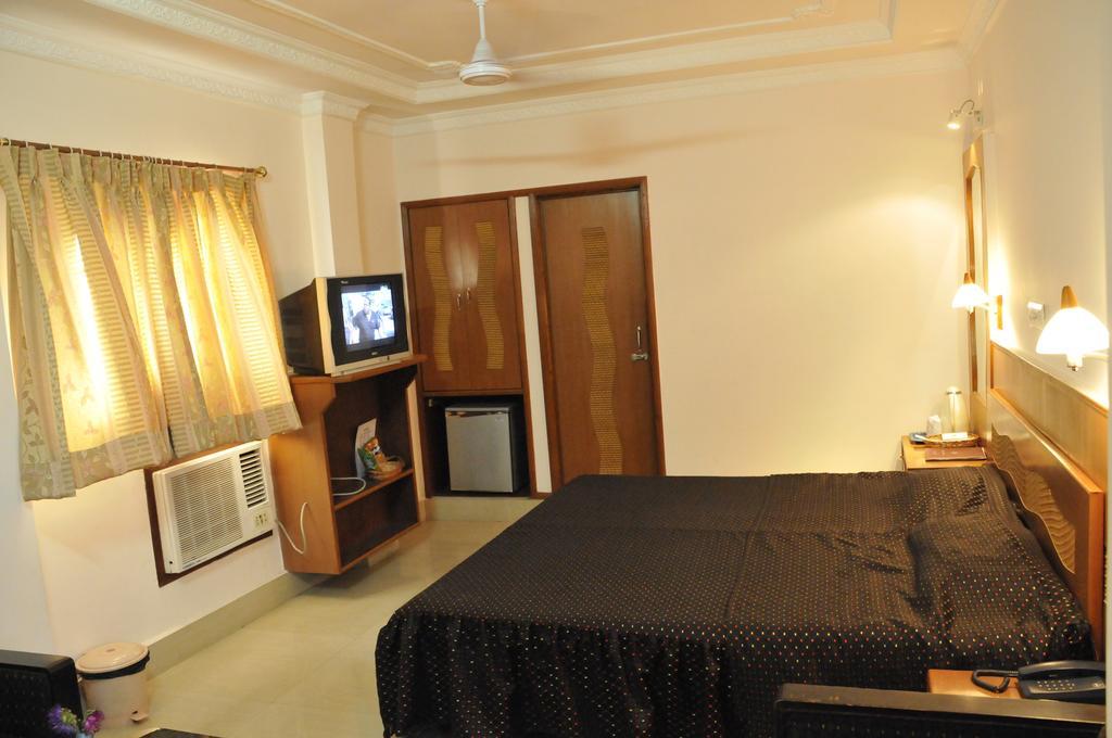 Hotel Heera Calcutta Rum bild