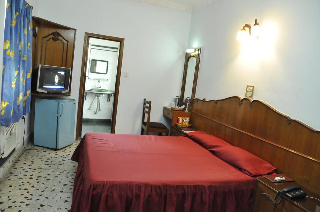 Hotel Heera Calcutta Rum bild