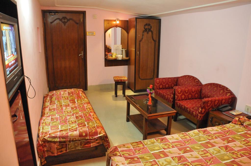 Hotel Heera Calcutta Rum bild